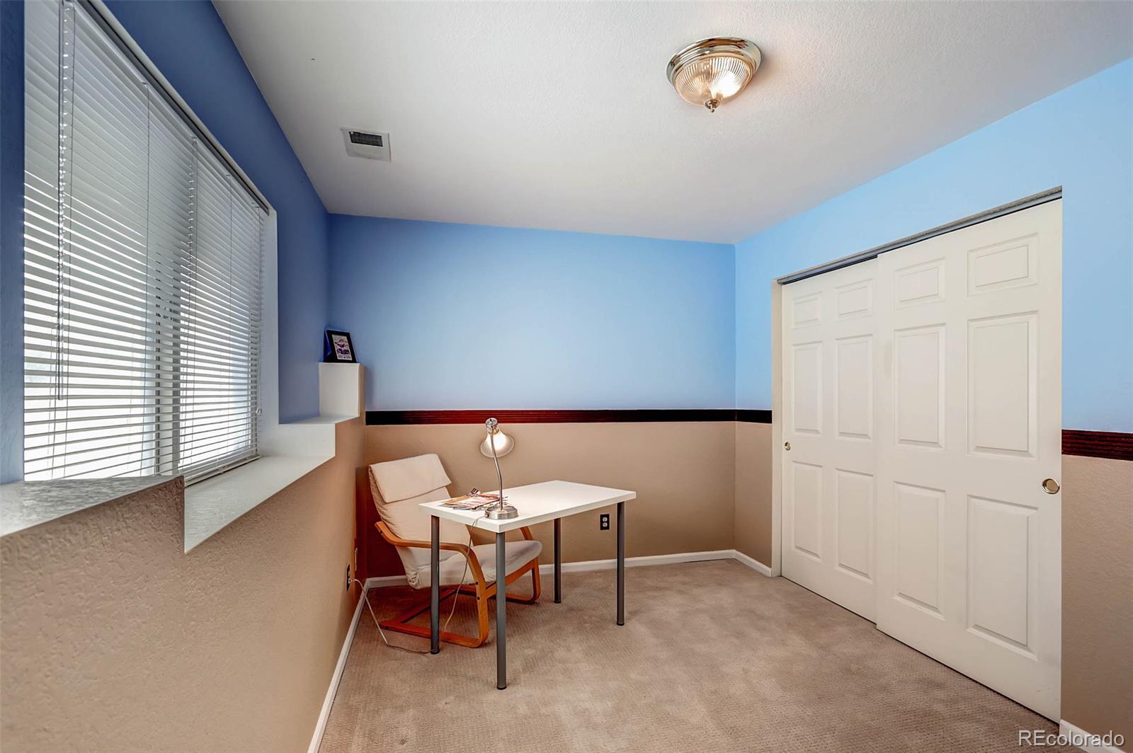 965 Wolff Street, Unit A Denver, CO 80204 - Photo 13 of 34 a view of a room with a table and chairs