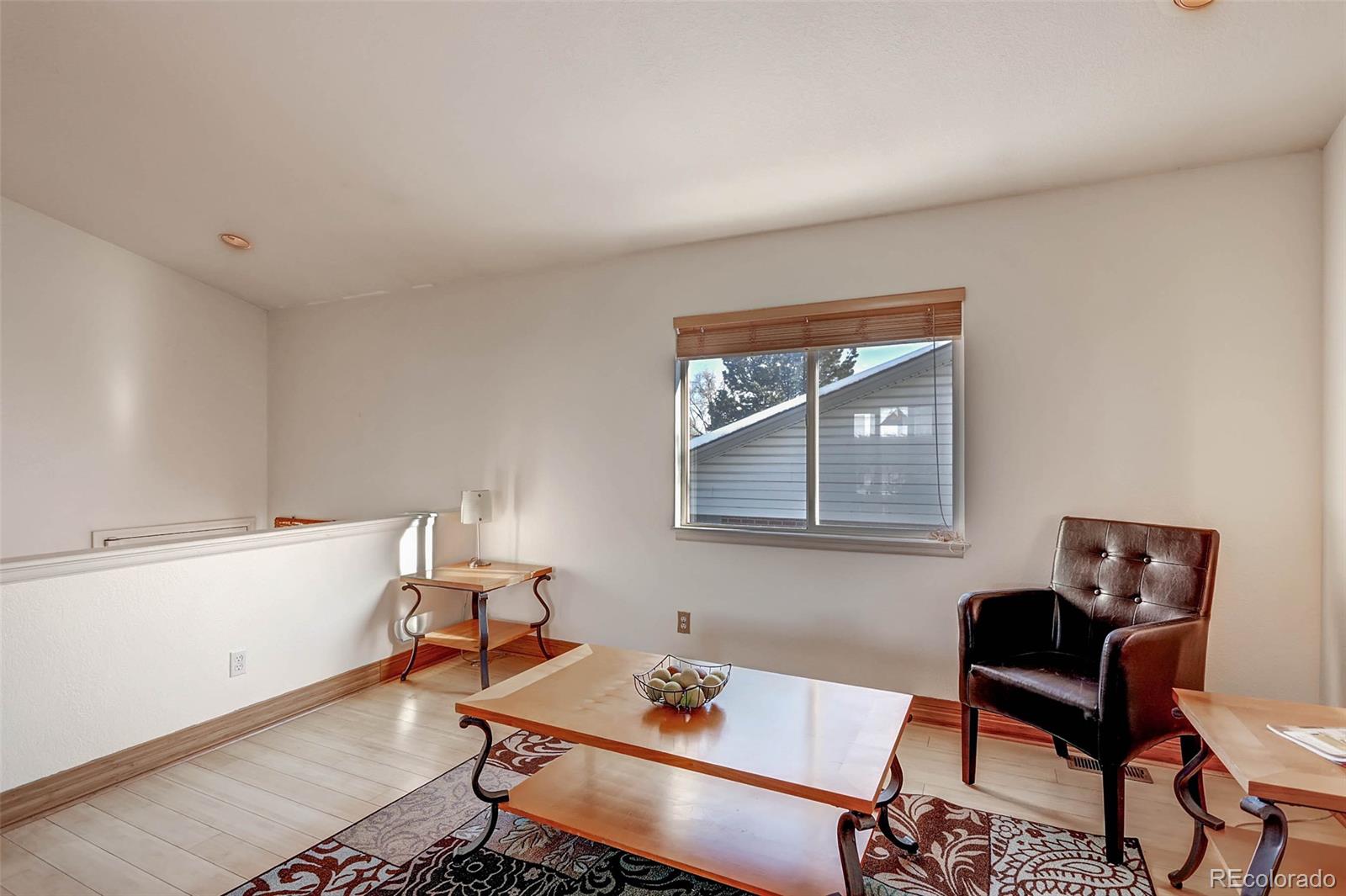965 Wolff Street, Unit A Denver, CO 80204 - Photo 16 of 34 a workspace with furniture and a window