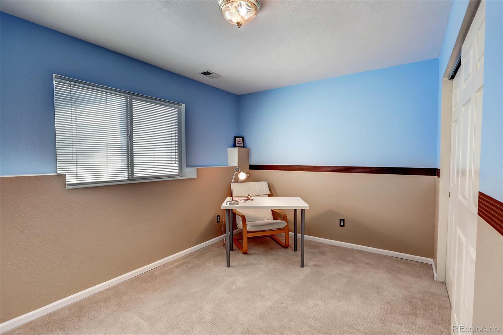 965 Wolff Street, Unit A Denver, CO 80204 - Photo 18 of 34 a workspace with furniture and window