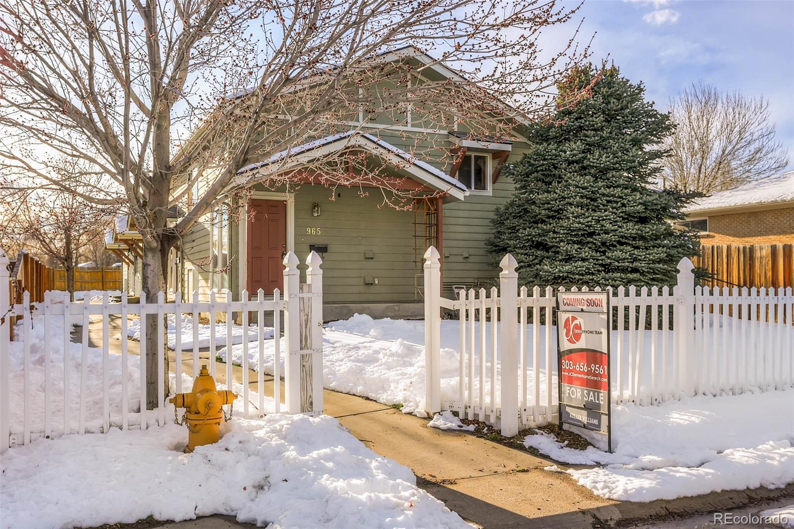 965 Wolff Street, Unit A Denver, CO 80204 - Photo 2 of 34 a view of a house with wooden fence