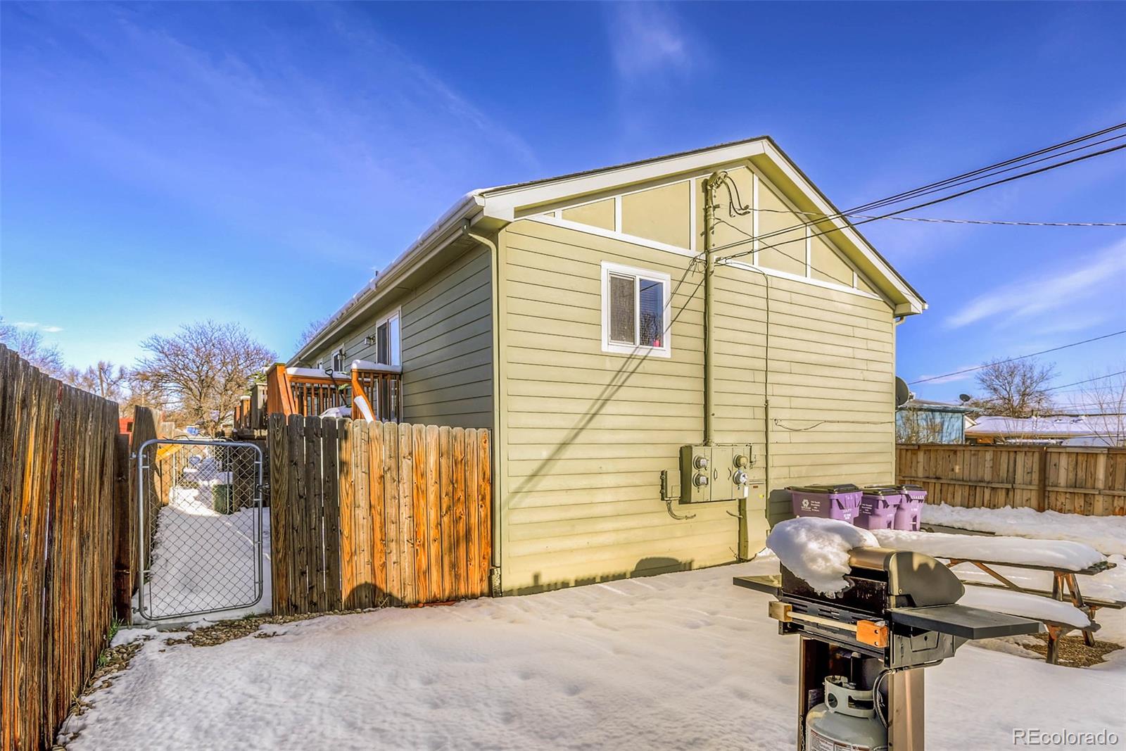 965 Wolff Street, Unit A Denver, CO 80204 - Photo 24 of 34 a view of a house with a backyard