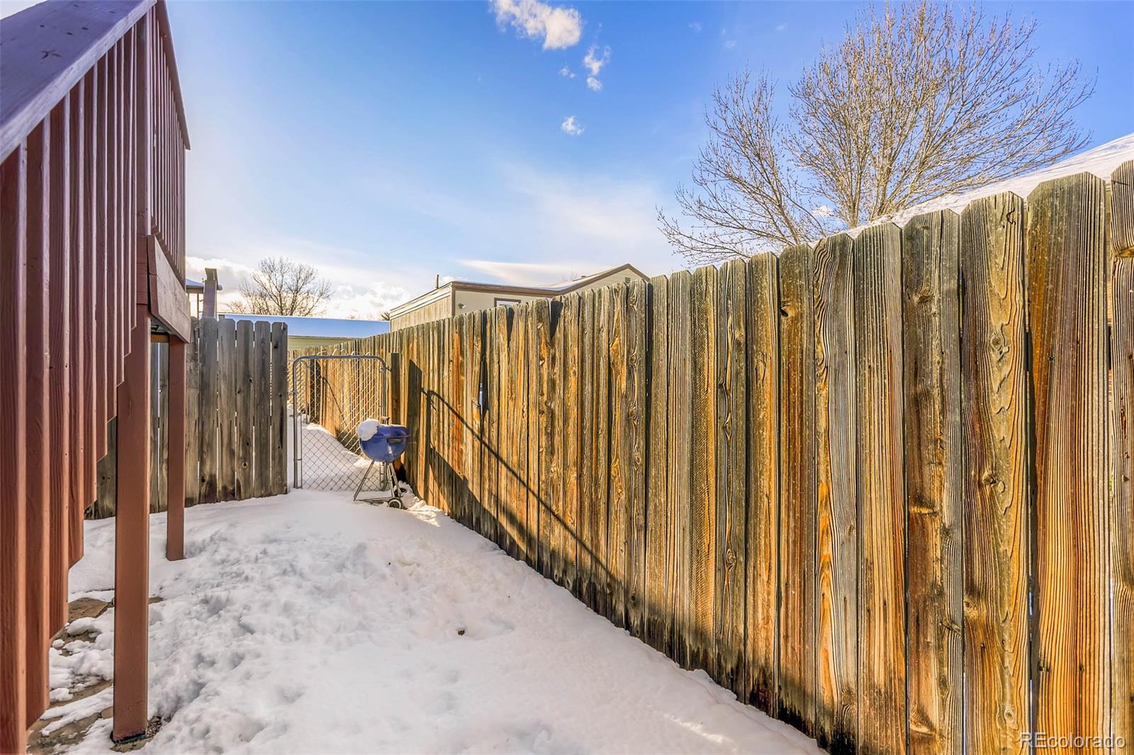 965 Wolff Street, Unit A Denver, CO 80204 - Photo 25 of 34 a view of a row of wooden fence