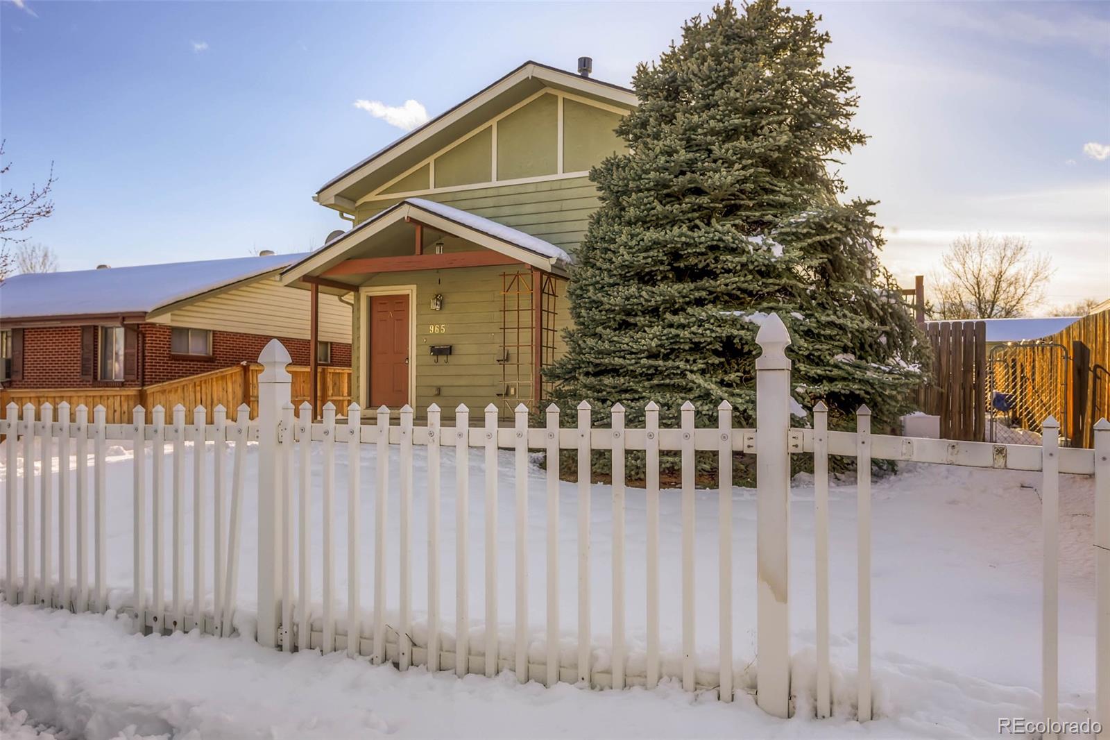 965 Wolff Street, Unit A Denver, CO 80204 - Photo 26 of 34 a view of a house with wooden fence