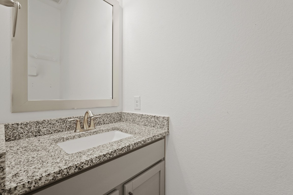 8010 Chantilly Manor Fulshear, TX 77441 - Photo 12 of 50 Ideal first-floor powder room, perfect for guests during gatherings.