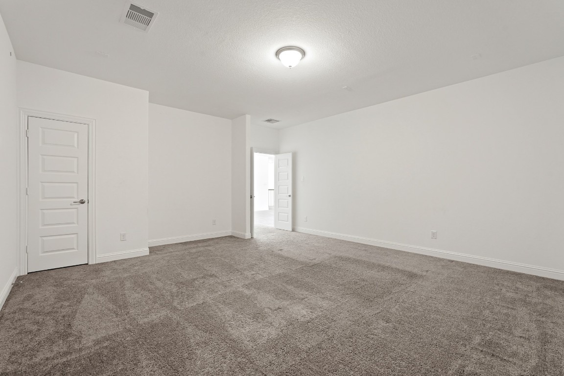 8010 Chantilly Manor Fulshear, TX 77441 - Photo 35 of 50 Enjoy quality family time and movie nights in the dedicated media room, designed for comfort and entertainment