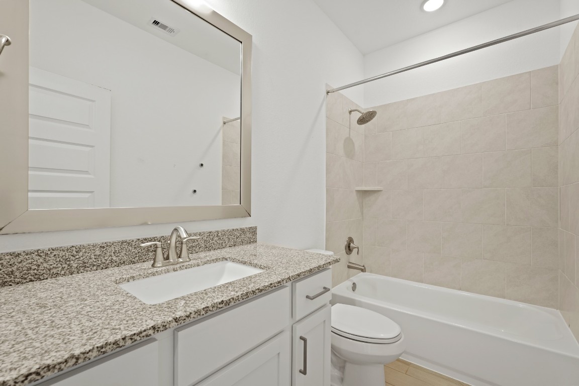 8010 Chantilly Manor Fulshear, TX 77441 - Photo 39 of 50 Convenient upstairs third bathroom for added comfort and privacy.