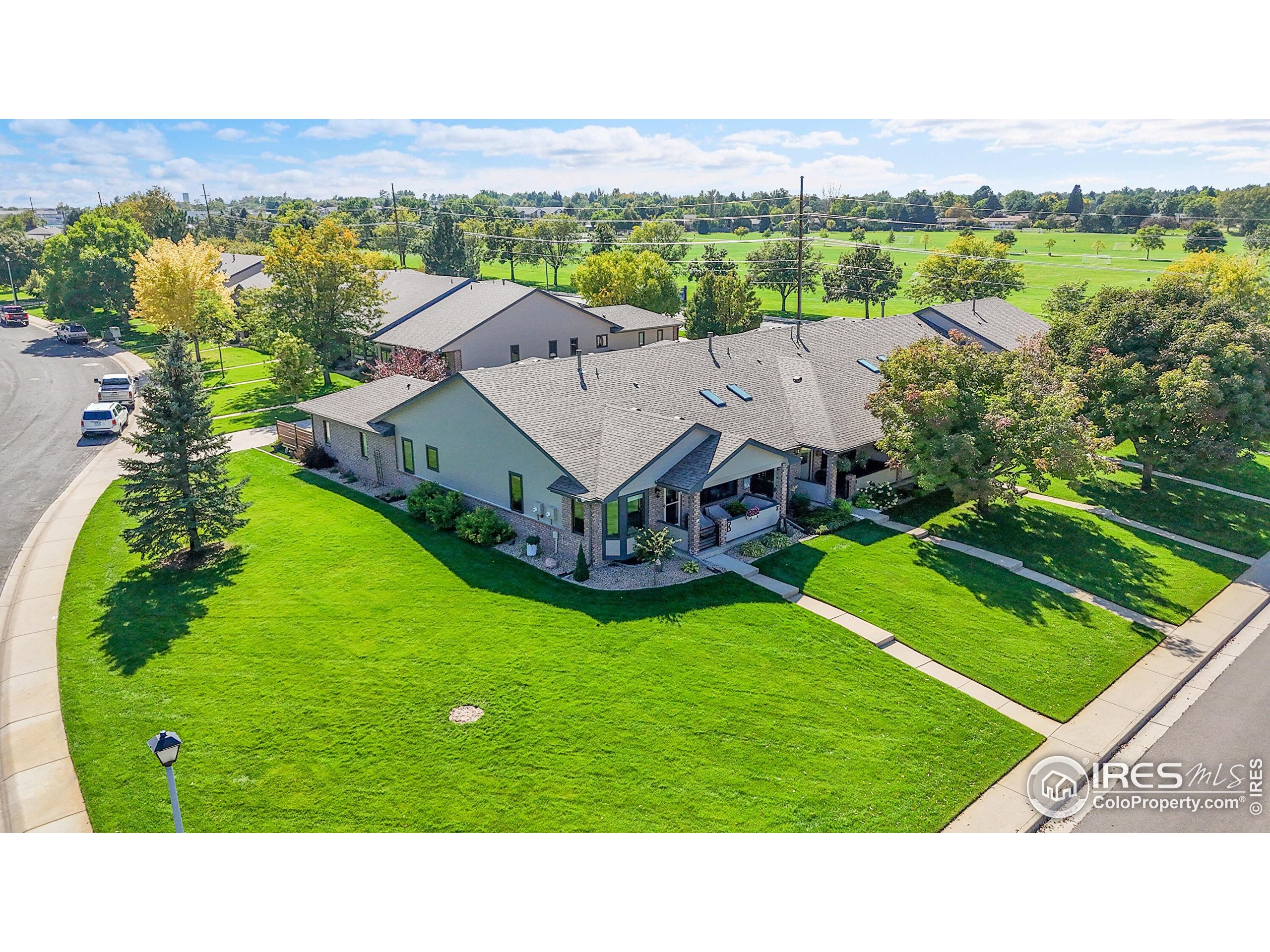 a aerial view of a house with pool
