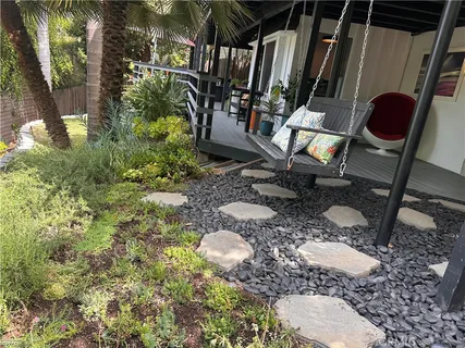 a view of an outdoor space with sitting area