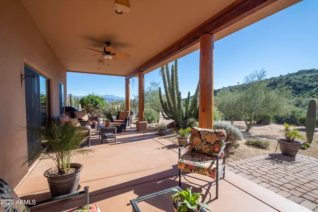 a large kitchen with a stove and large window