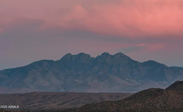 a bathroom with a sink a toilet and a shower