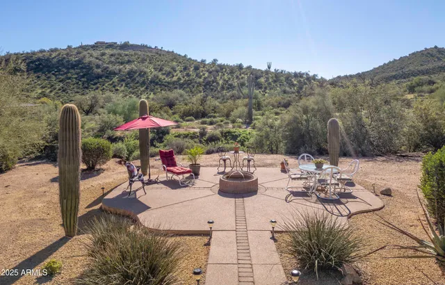a view of a terrace with furniture