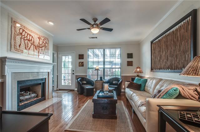 615 Gen George Patton Road Nashville, TN 37221 - Photo 8 of 20 The den has a fireplace with gas logs and built-in shelving and cabinet.
