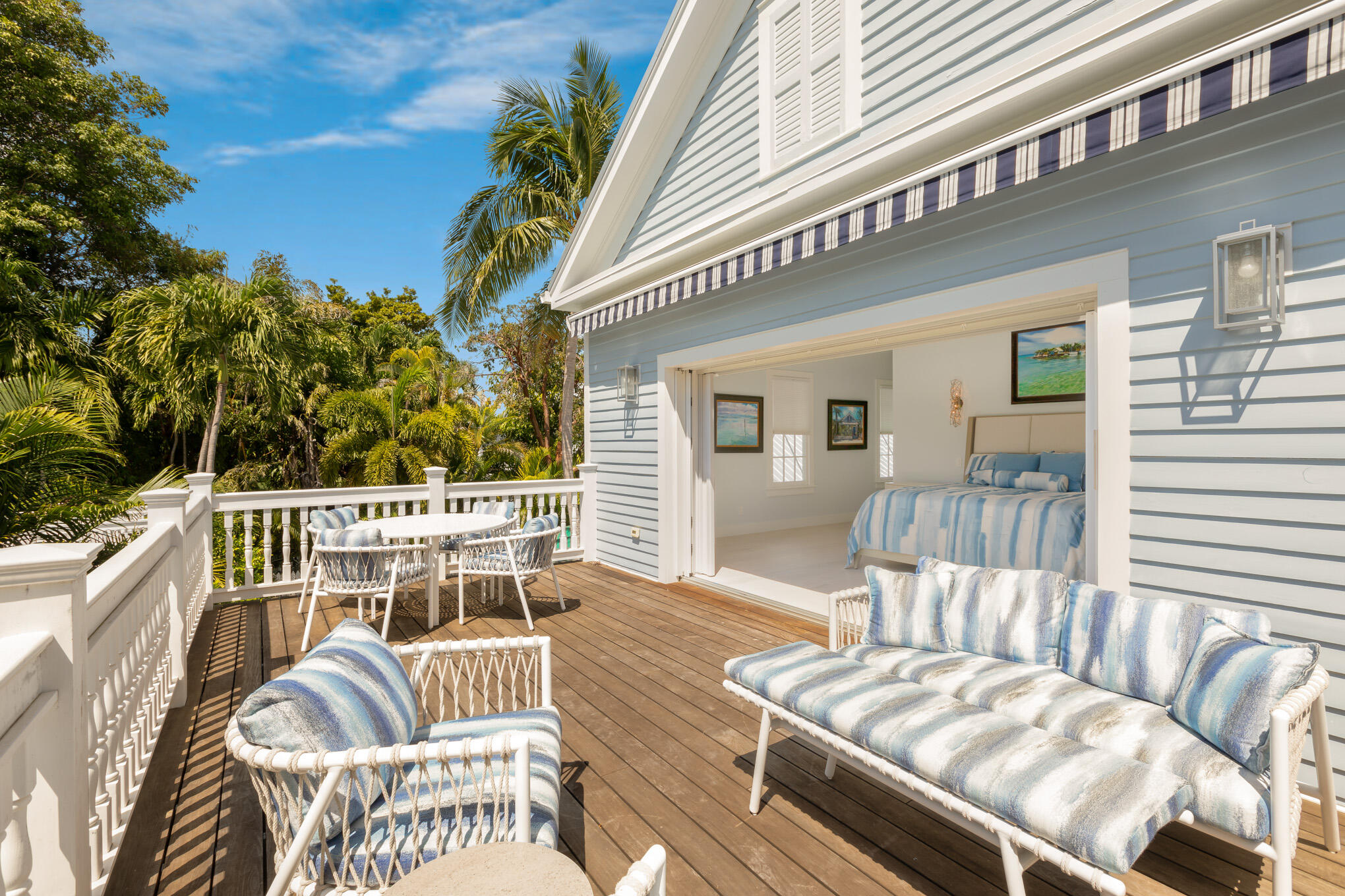 626 William Street Key West, FL 33040 - Photo 16 of 68 a view of a chair and tables front of the house