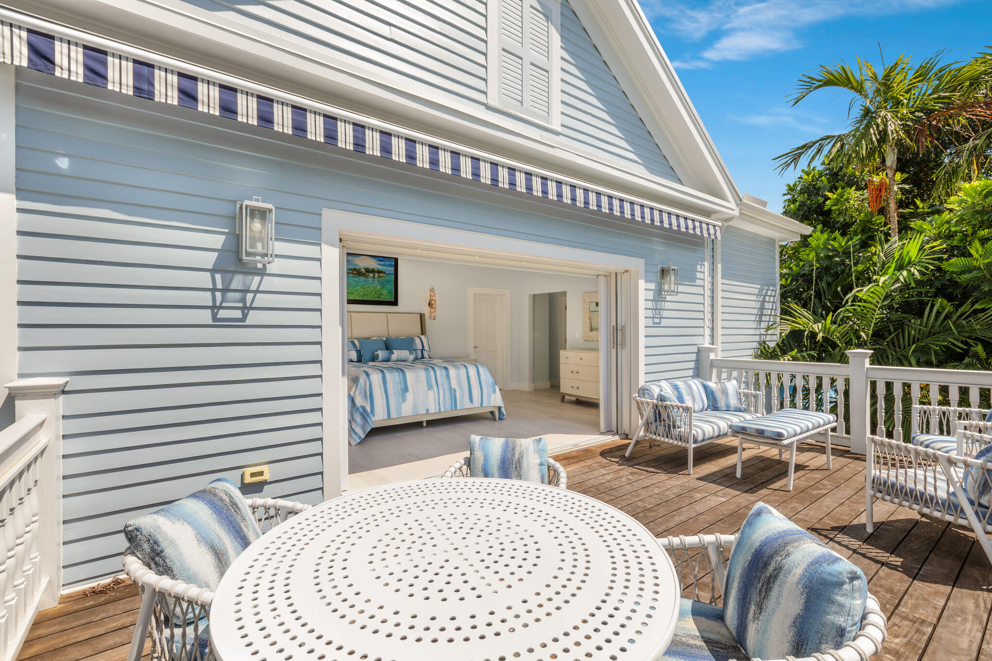 626 William Street Key West, FL 33040 - Photo 18 of 68 a balcony with furniture and a potted plant