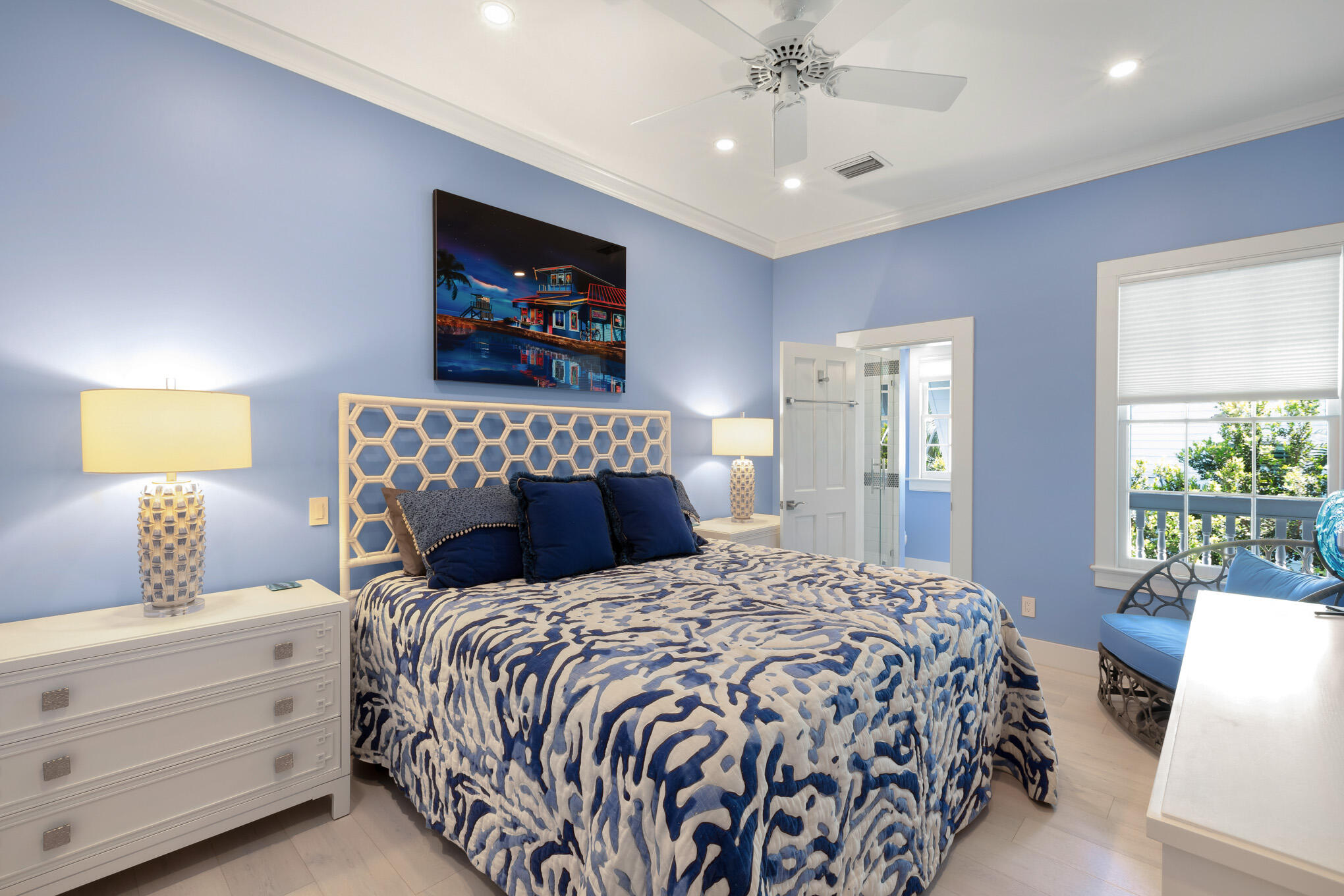 626 William Street Key West, FL 33040 - Photo 23 of 68 a bedroom with a large bed and a chandelier