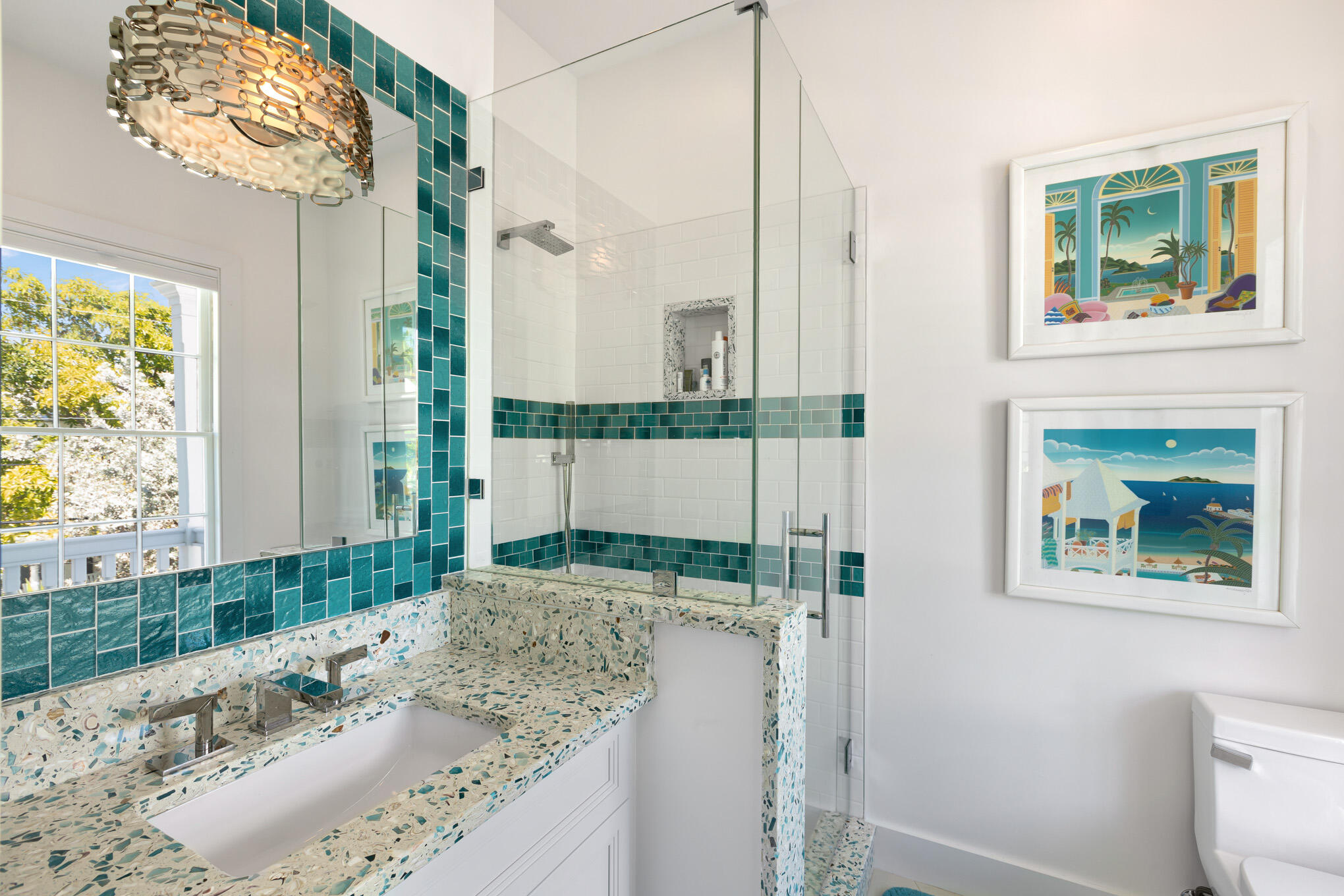 626 William Street Key West, FL 33040 - Photo 28 of 68 a bathroom with a granite countertop sink a toilet a mirror and shower