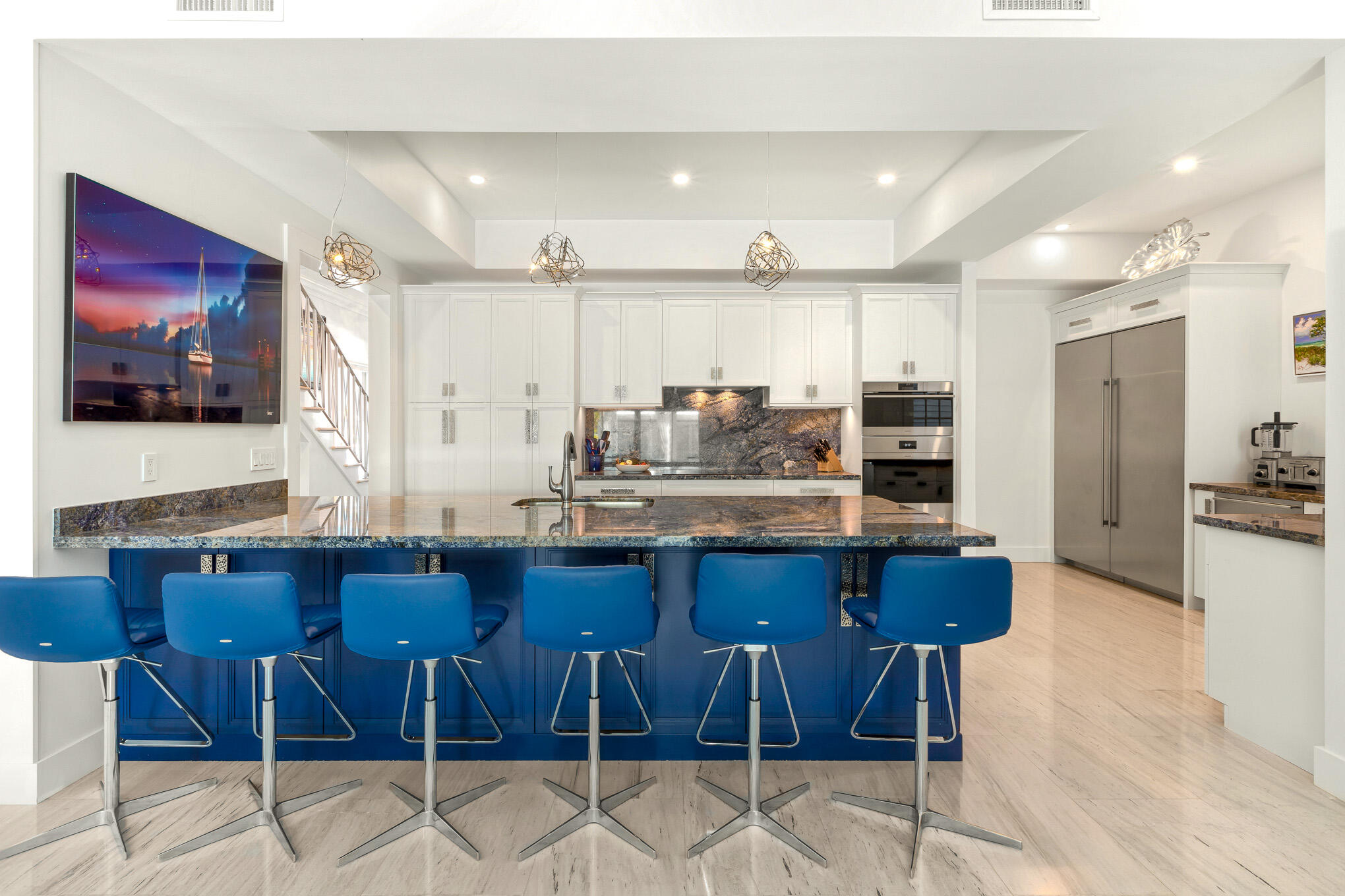 626 William Street Key West, FL 33040 - Photo 39 of 68 a kitchen with a cabinets and chairs