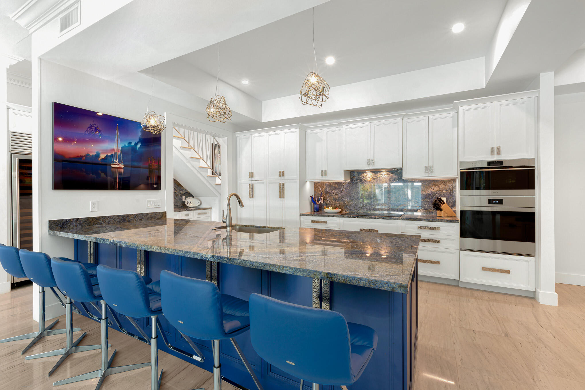 626 William Street Key West, FL 33040 - Photo 40 of 68 a kitchen with stainless steel appliances granite countertop a sink a stove a table and chairs