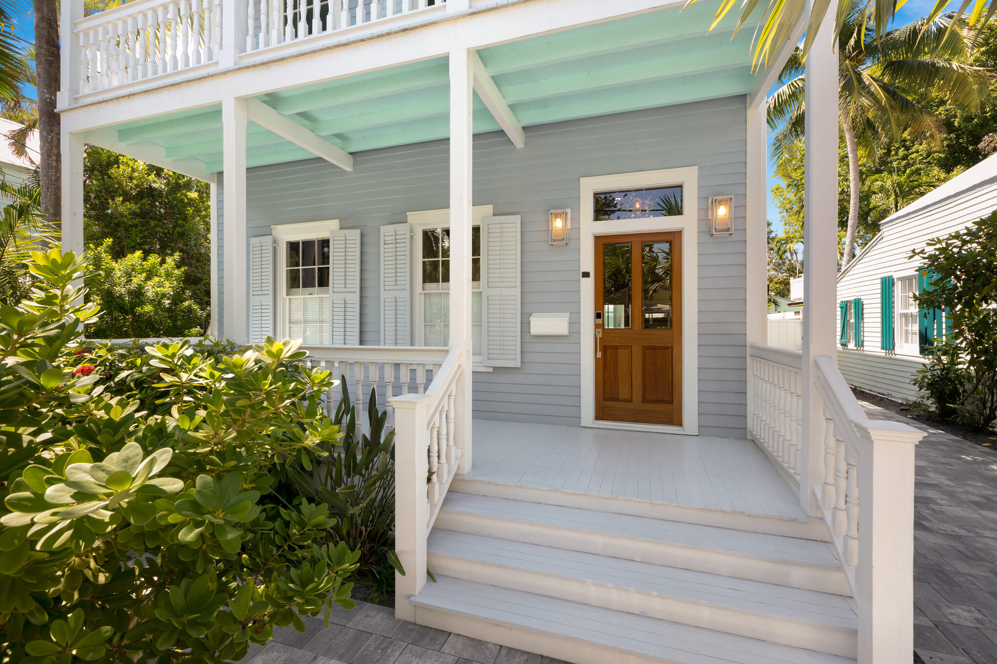 626 William Street Key West, FL 33040 - Photo 4 of 68 a front view of a house with a garden
