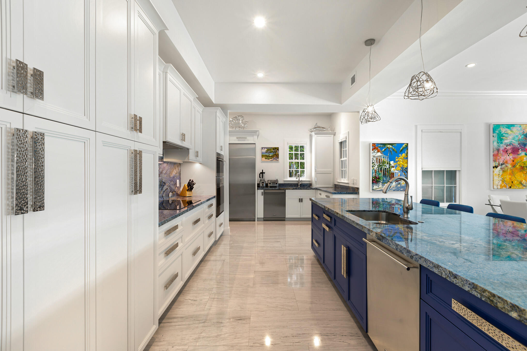 626 William Street Key West, FL 33040 - Photo 44 of 68 a large kitchen with stainless steel appliances granite countertop a lot of counter space