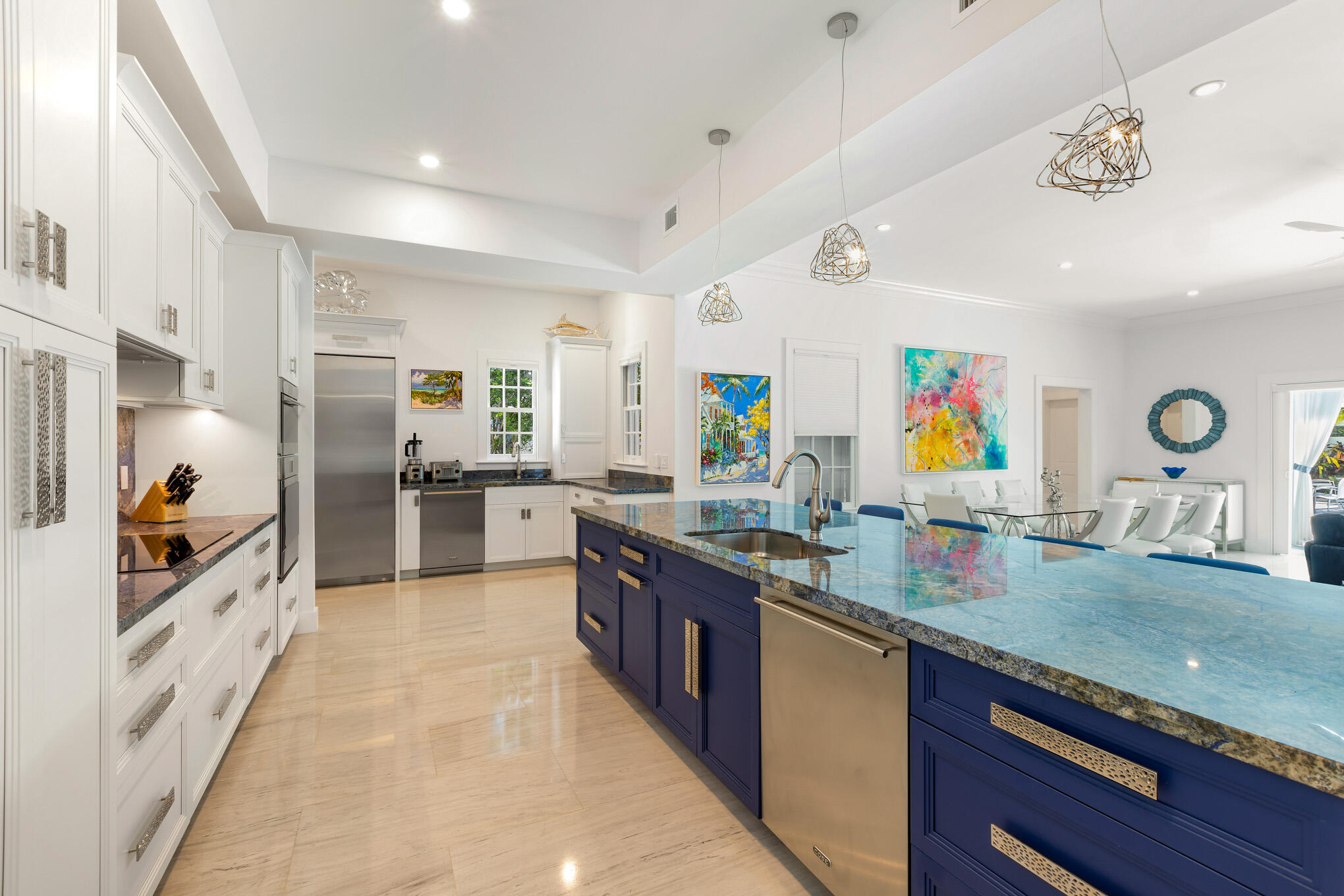 626 William Street Key West, FL 33040 - Photo 45 of 68 a kitchen with stainless steel appliances granite countertop a sink and cabinets