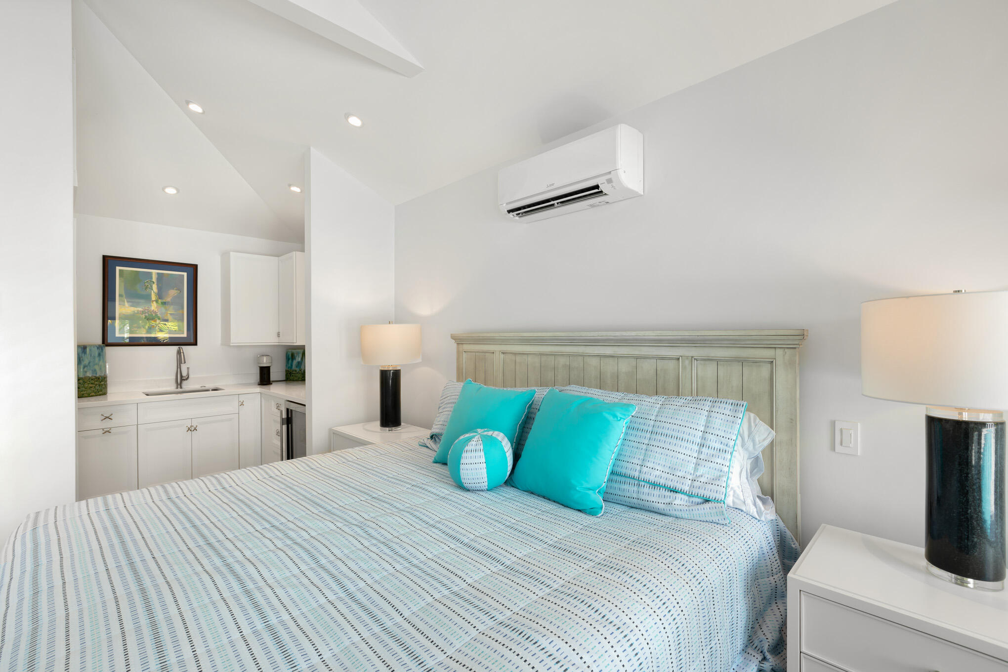 626 William Street Key West, FL 33040 - Photo 59 of 68 a bedroom with a large bed and a chandelier