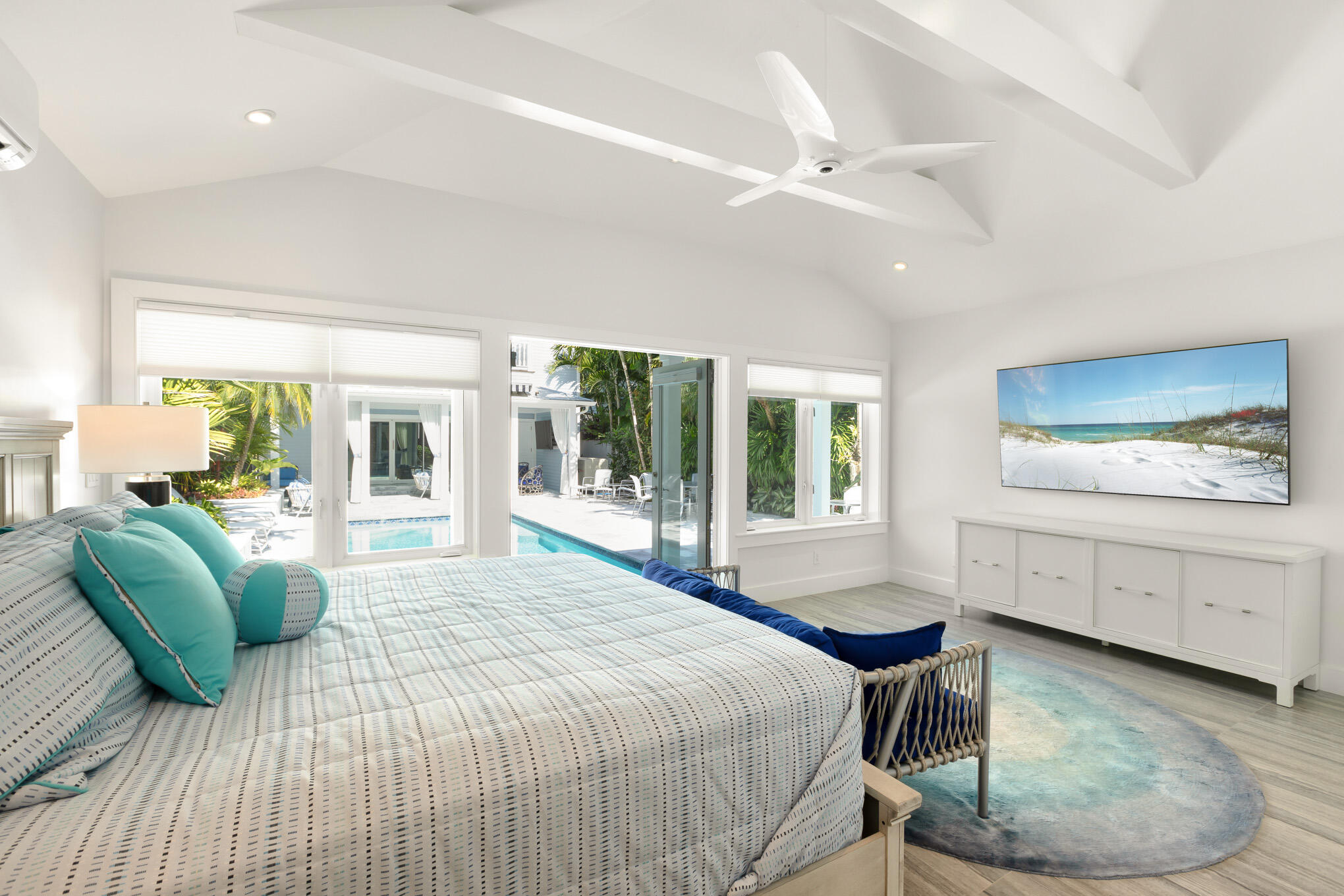 626 William Street Key West, FL 33040 - Photo 61 of 68 a bedroom with a bed and a mirror on the dresser