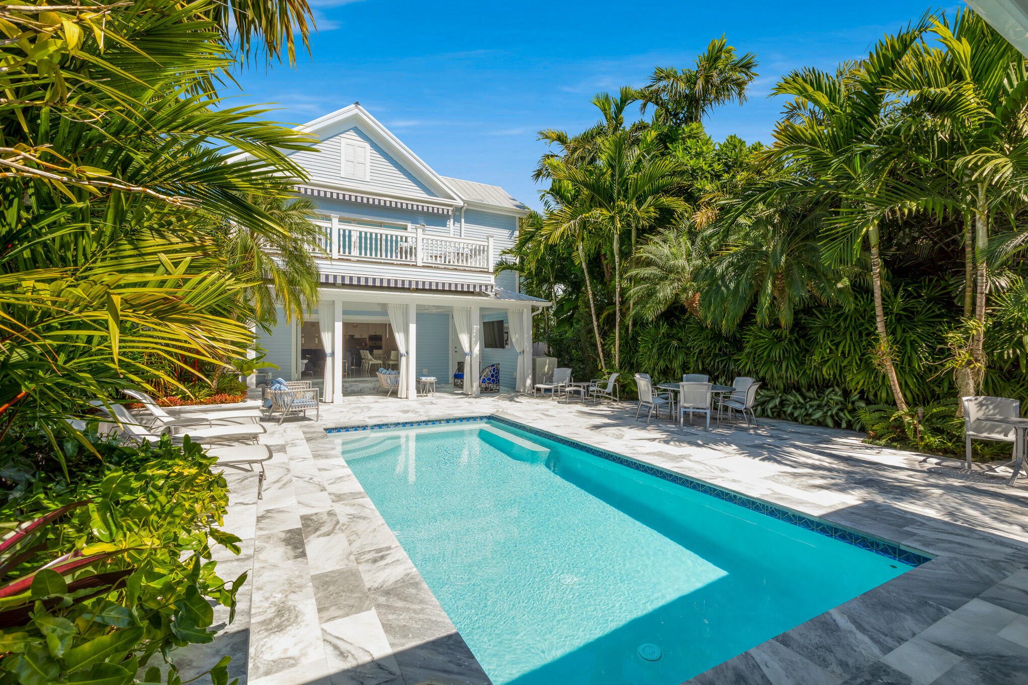 626 William Street Key West, FL 33040 - Photo 62 of 68 a view of house with swimming pool outdoor seating