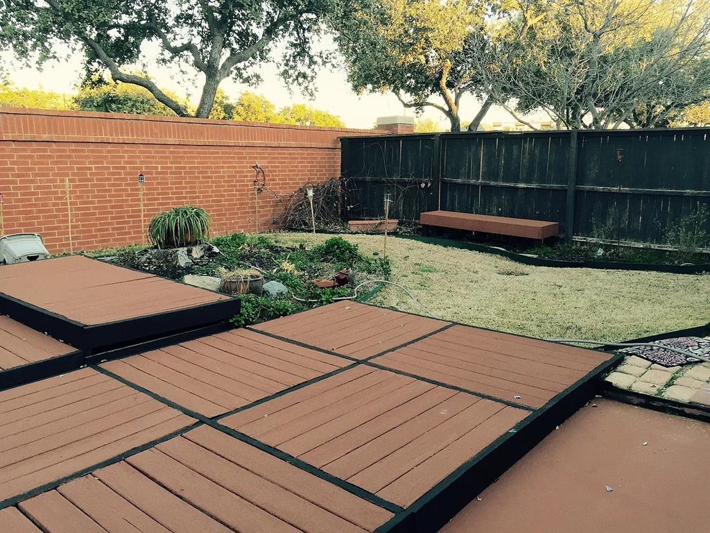 519 Ranch Trail, Unit 134 Irving, TX 75063 - Photo 8 of 20 a view of a backyard with sitting area