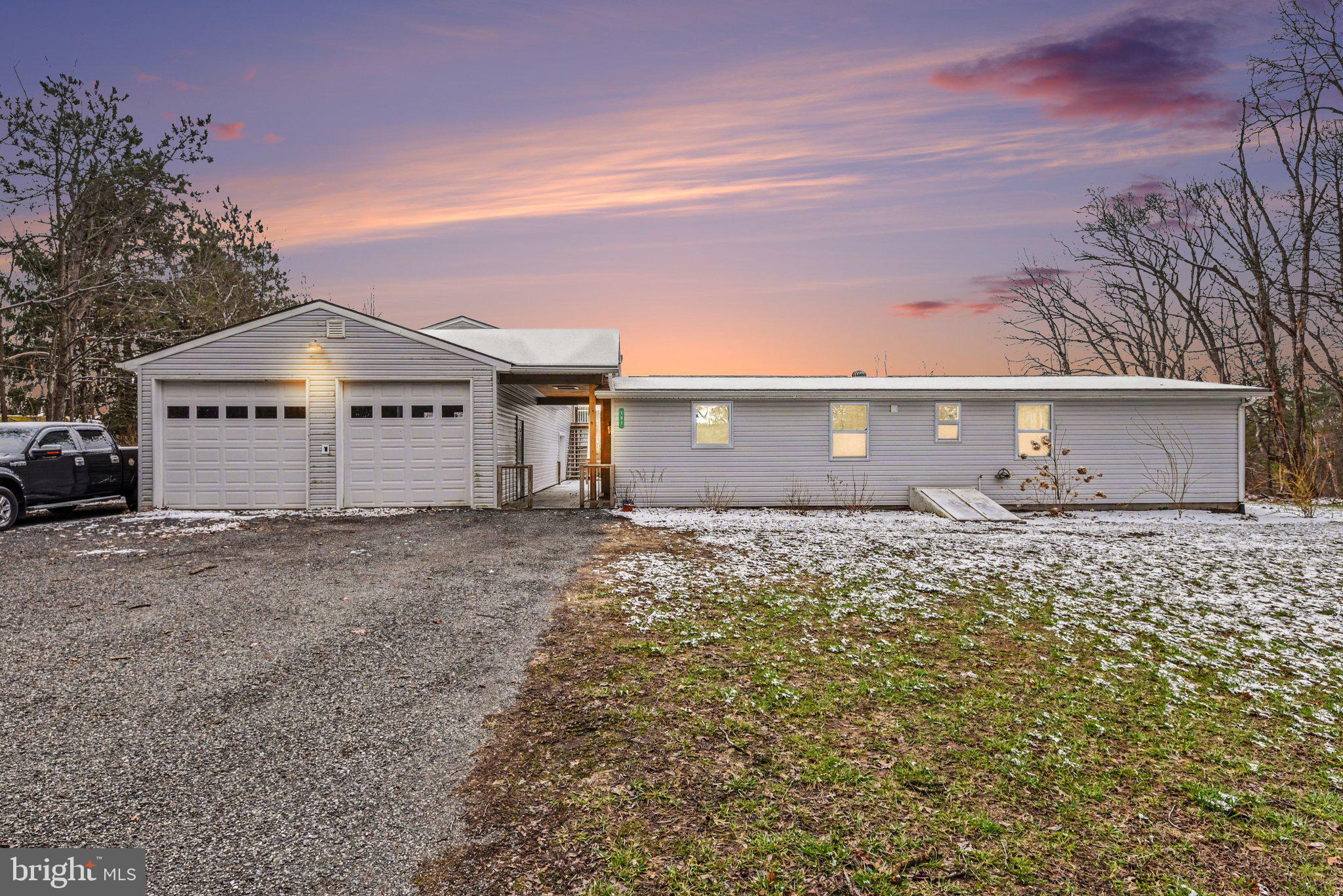 Rustic charm, fully updated nestled on one acre!