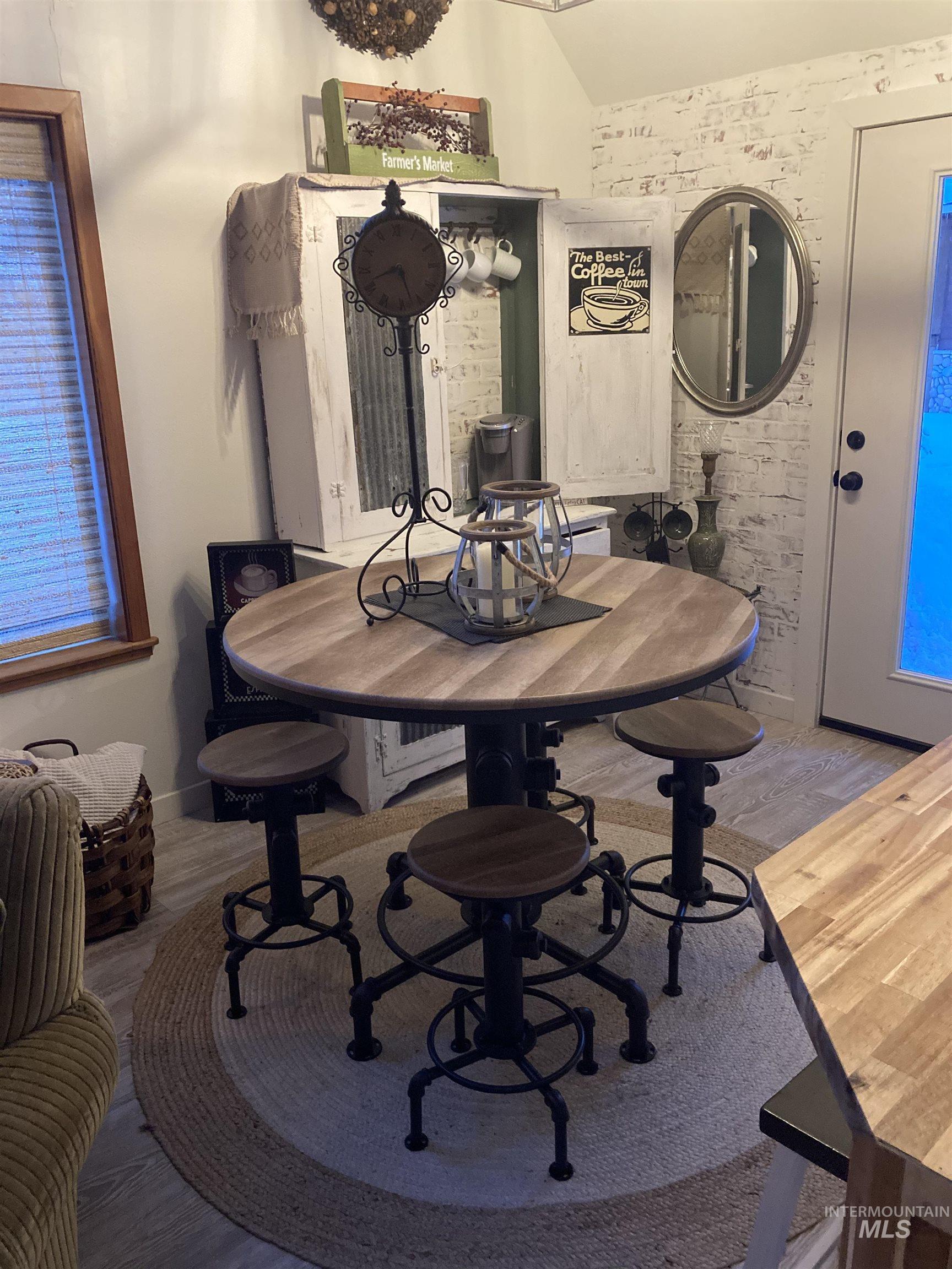 306 Rio Vista Boulevard McCall, ID 83638 - Photo 19 of 40 Dining area with vaulted ceiling and wood finished floors