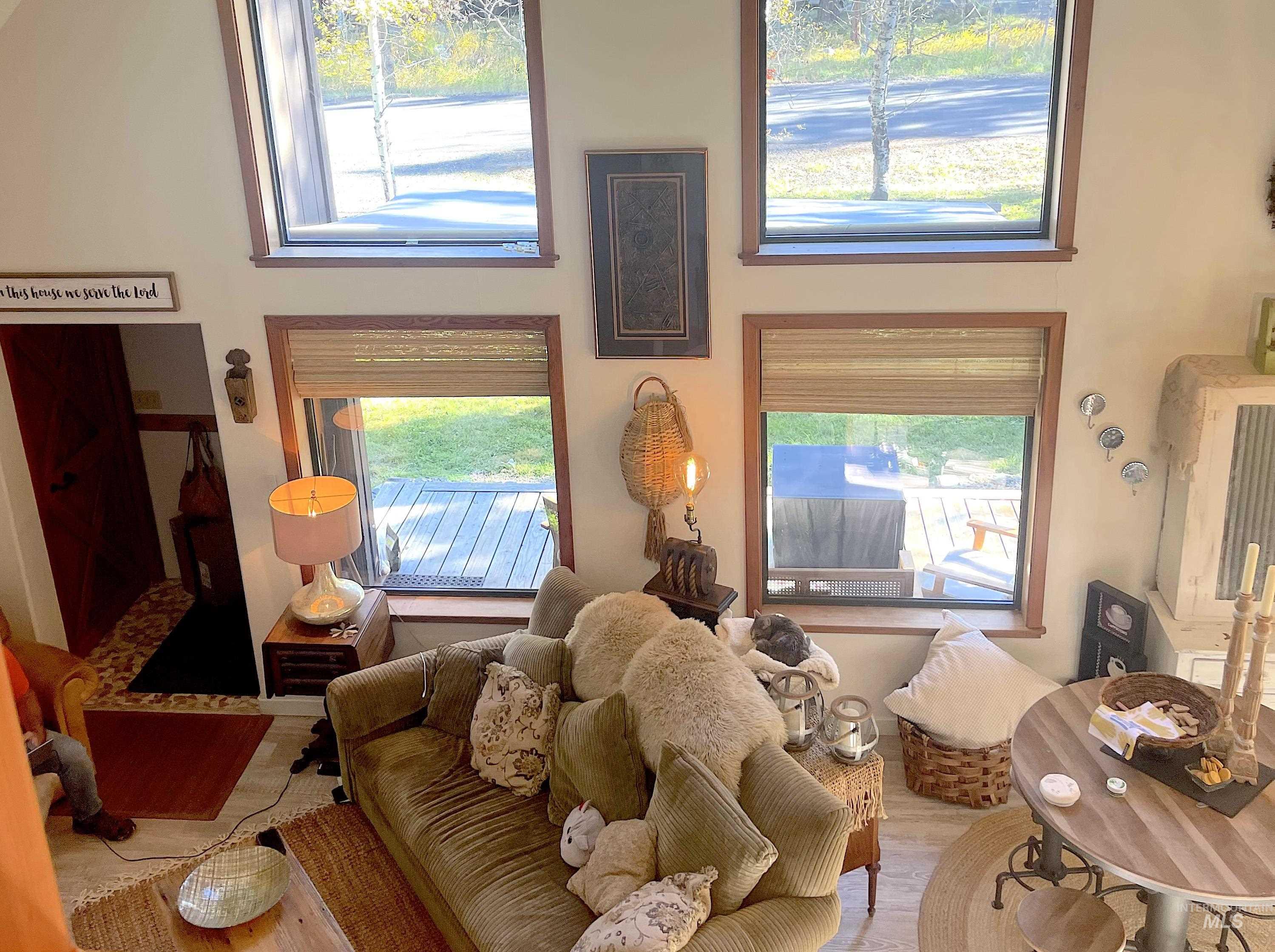 306 Rio Vista Boulevard McCall, ID 83638 - Photo 31 of 40 Living room with healthy amount of natural light and wood finished floors