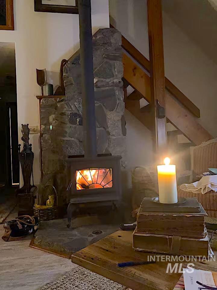 306 Rio Vista Boulevard McCall, ID 83638 - Photo 6 of 40 Detailed view of a wood stove and wood finished floors
