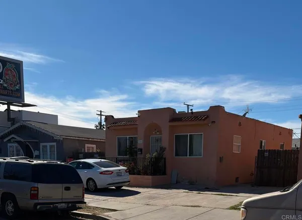 a car parked in front of a house