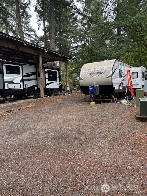 1546 Reservation Road Southeast, Unit 188 Olympia, WA 98513 - Photo 1 of 20 a view of a car park in front of house