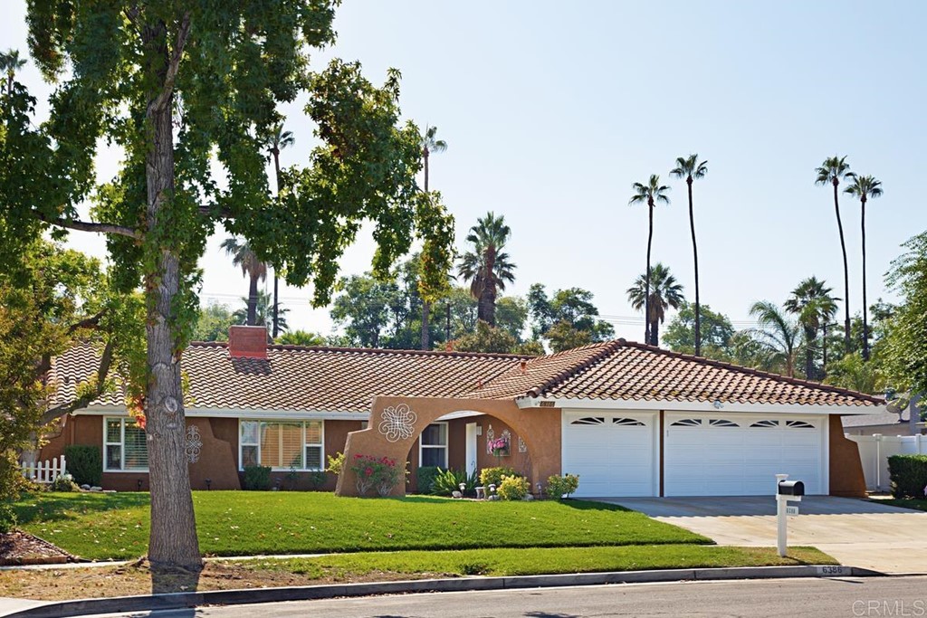 6386 Foster Drive Riverside, CA 92506 - Photo 1 of 1 a front view of a house with a garden