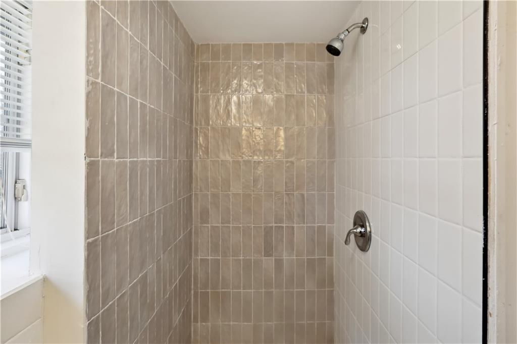 1512 Flat Shoals Road Atlanta, GA 30349 - Photo 21 of 35 a bathroom with a shower