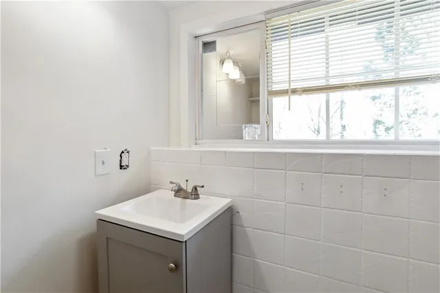 a bathroom with a sink and a vanity