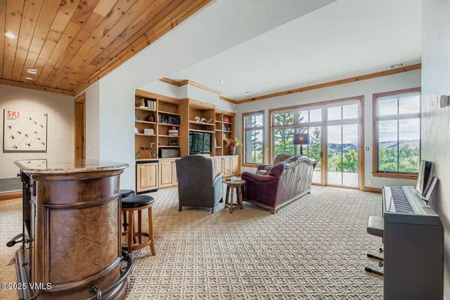 a workspace with furniture window and outside view