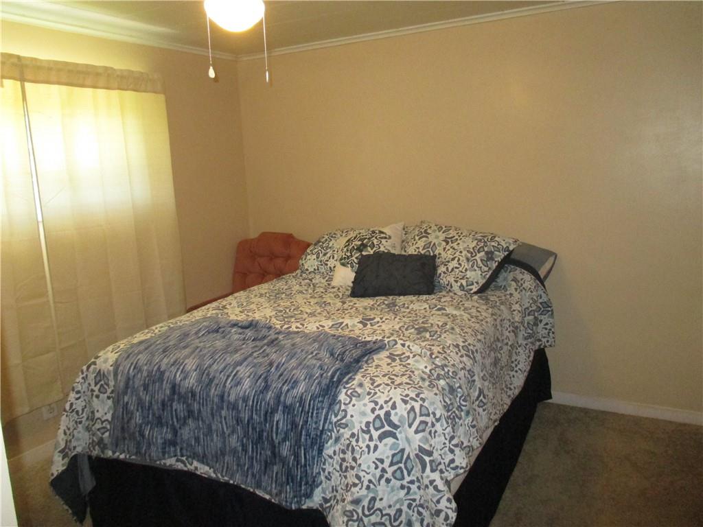 120 Coolspring Road Indiana, PA 15701 - Photo 13 of 23 a bedroom with a bed and a table in it