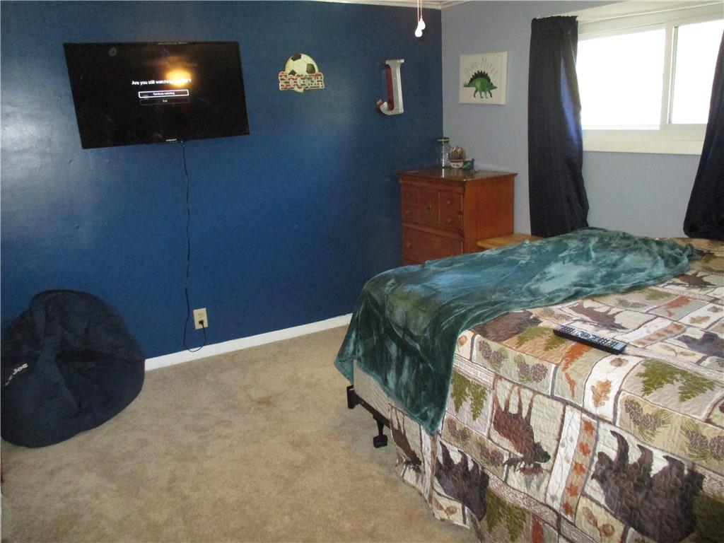 120 Coolspring Road Indiana, PA 15701 - Photo 14 of 23 a bedroom with a bed and a lamp on dresser