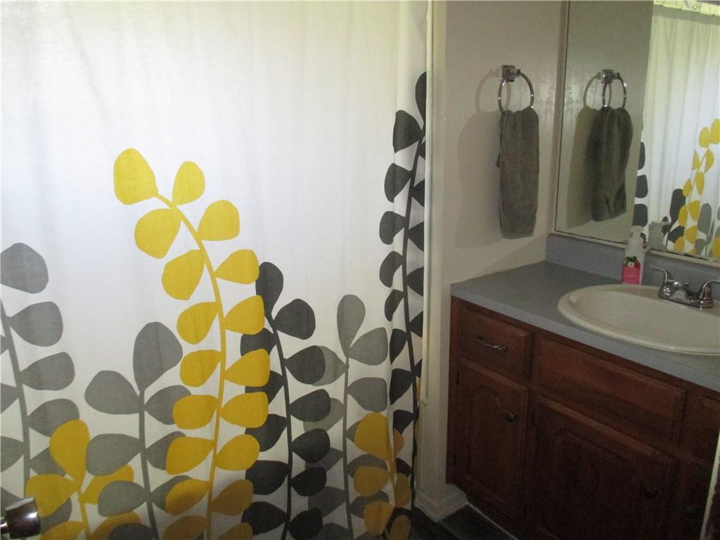 120 Coolspring Road Indiana, PA 15701 - Photo 16 of 23 a bathroom with a sink and a mirror