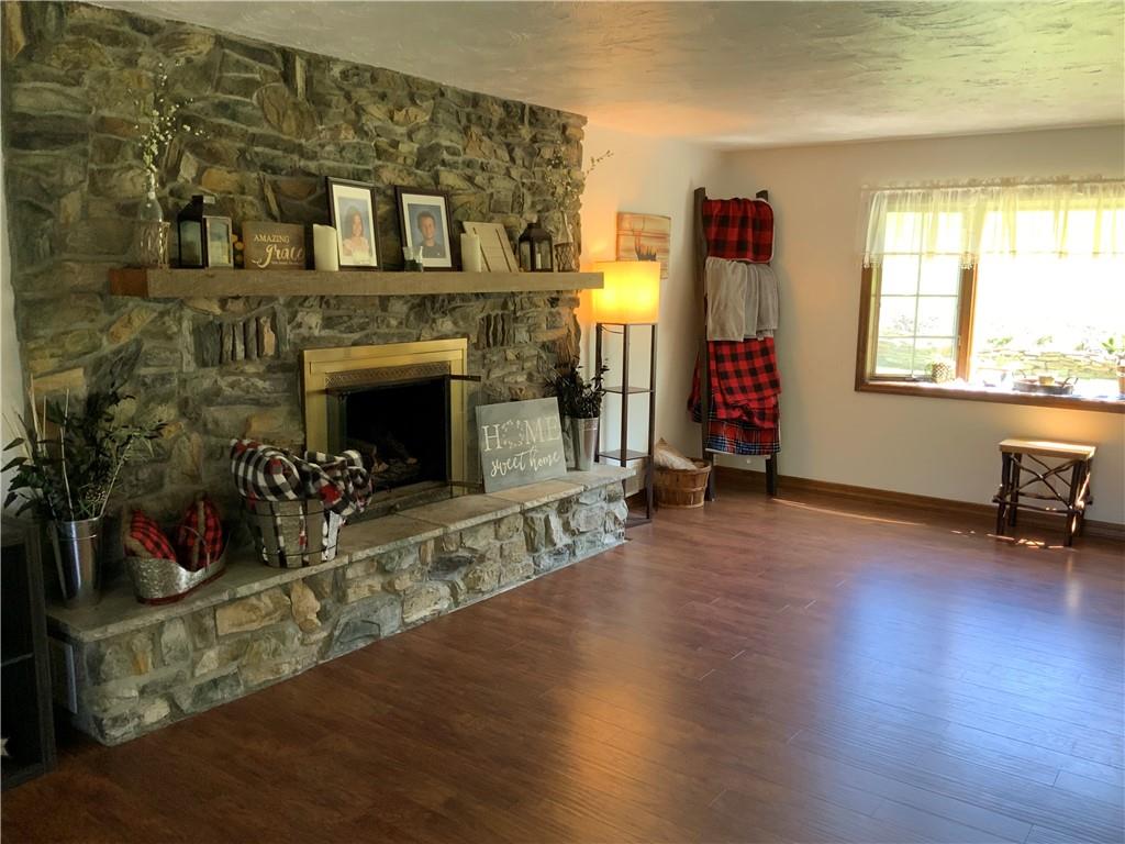 120 Coolspring Road Indiana, PA 15701 - Photo 8 of 23 a living room with furniture and a fireplace