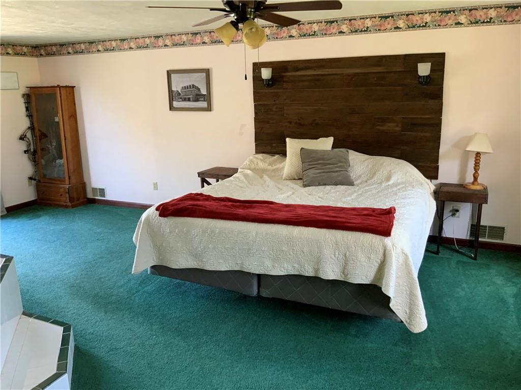 120 Coolspring Road Indiana, PA 15701 - Photo 10 of 23 a bed sitting in a room next to a window