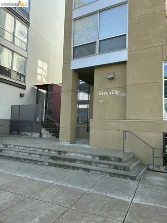 a view of a brick house with a large windows