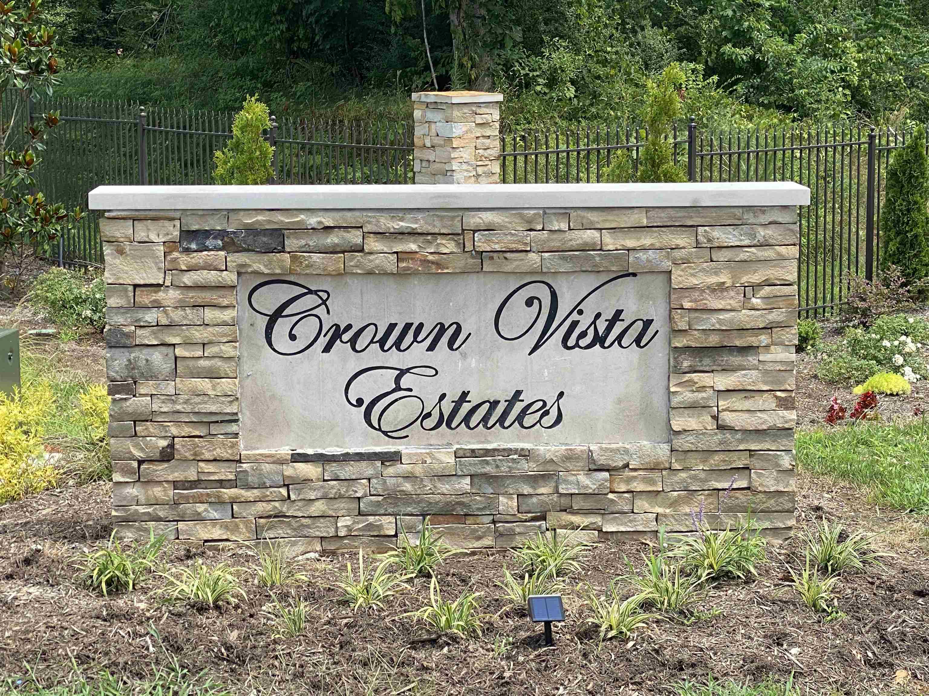 85 Crown Vista Lane Southwest Piperton, TN 38017 - Photo 2 of 6 a view of a sign under a street