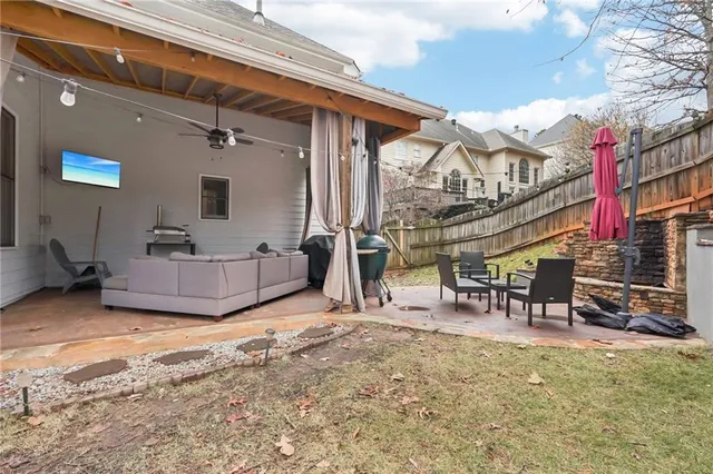 a view of a house with furniture and a area