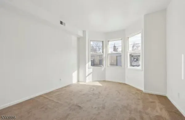 an empty room with a workbench