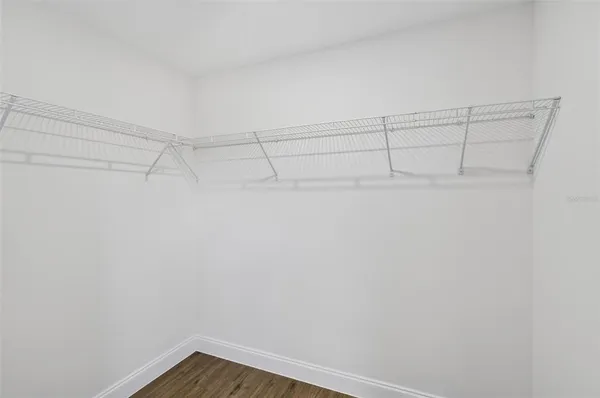 a view of a room with racks on the wall
