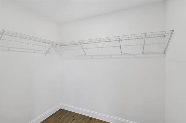 a view of a room with racks on the wall